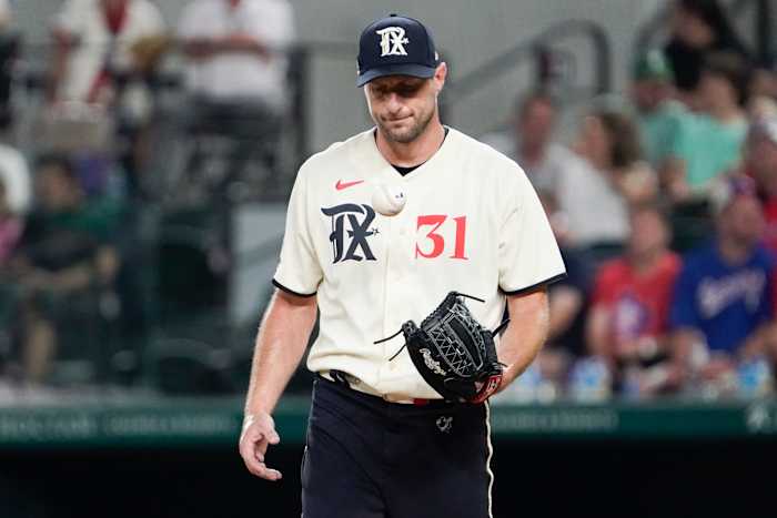 Sep 1, 2023; Arlington, Texas, USA; Texas Rangers starting pitcher Max Scherzer (31) reacts after giving up a single during the fourth inning against the Minnesota Twins at Globe Life Field. Mandatory Credit: Raymond Carlin III-USA TODAY Sports